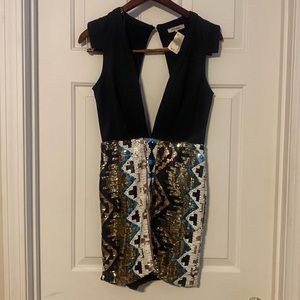 NWT Backless low cut dress size S top is black bottom is multi color sequins